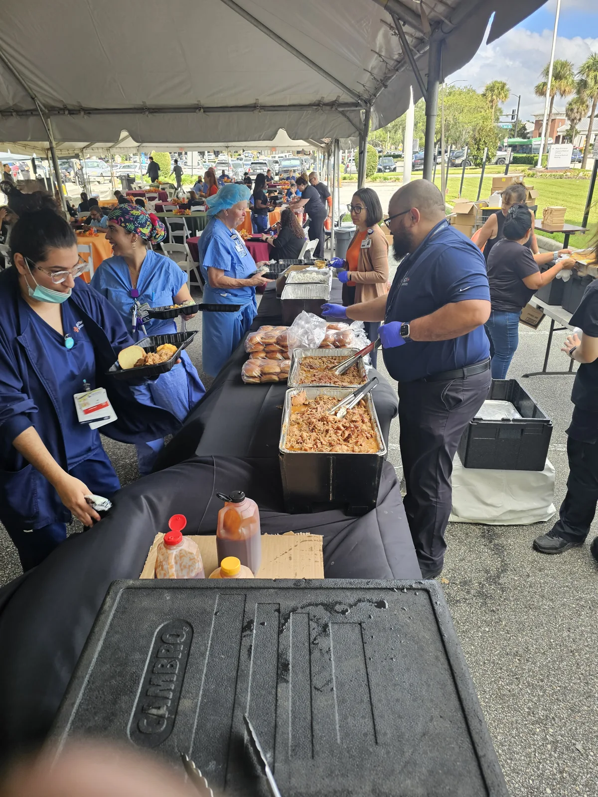 Jimmy Bear's BBQ serving guests at HCA Florida Osceola Hospital's Fall Festival